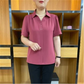 Elegant bluse til kvinder med V-udskæring, korte ærmer og ensfarvet design